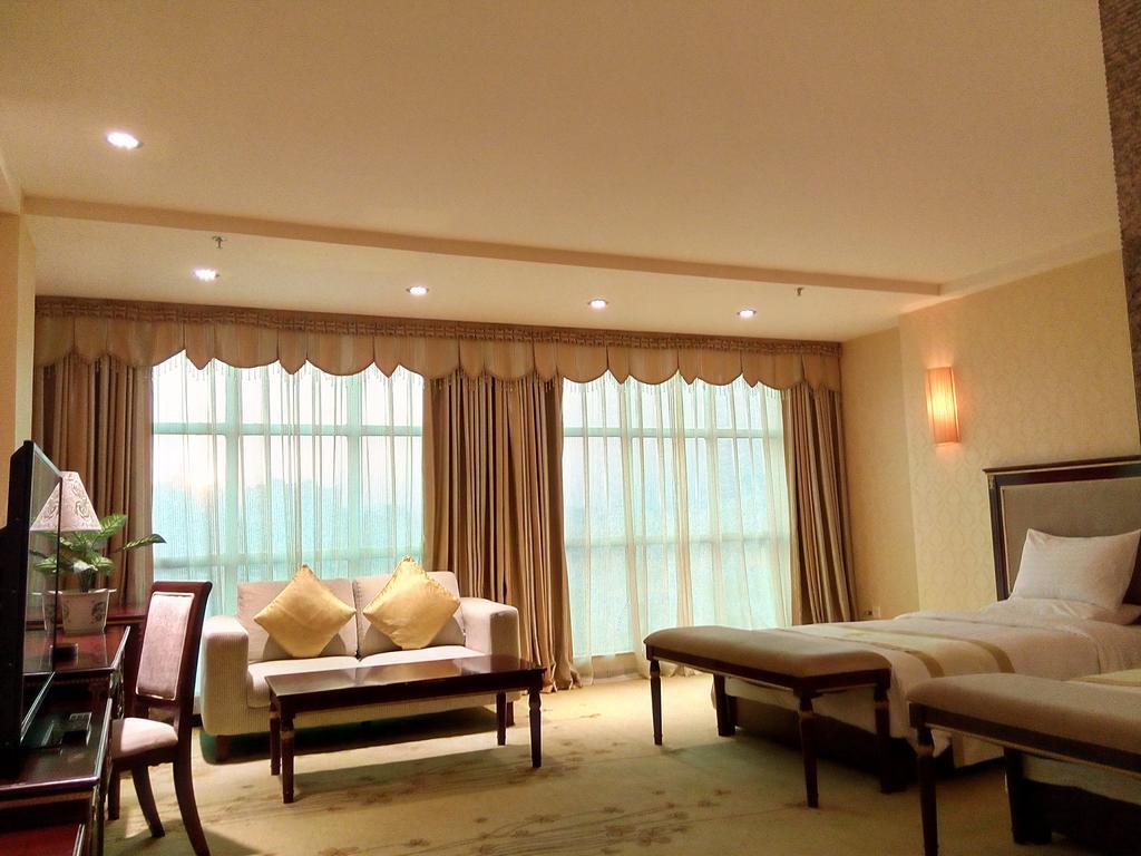 Guangzhou Li Gang Hotel Cantón Habitación foto